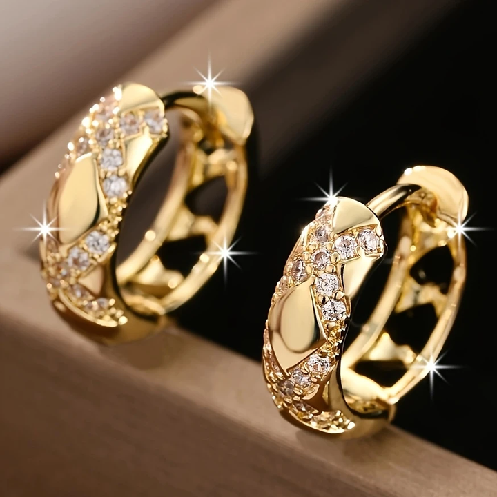 Boucles d'oreilles pendantes avec ouverture et éclat | Or
