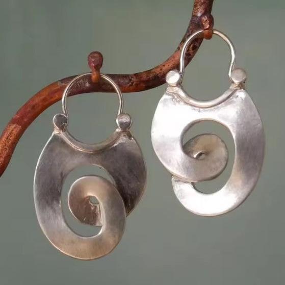 Boucles d'oreilles vintage avec spirale | Or blanc