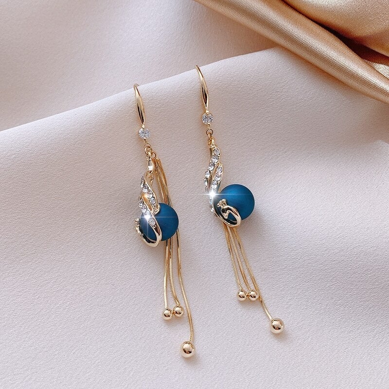 Boucles d'oreilles festives avec des marguerites bleues | Or