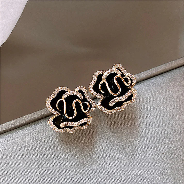 Boucles d'oreilles pendantes « fleur de lotus noire » | Or