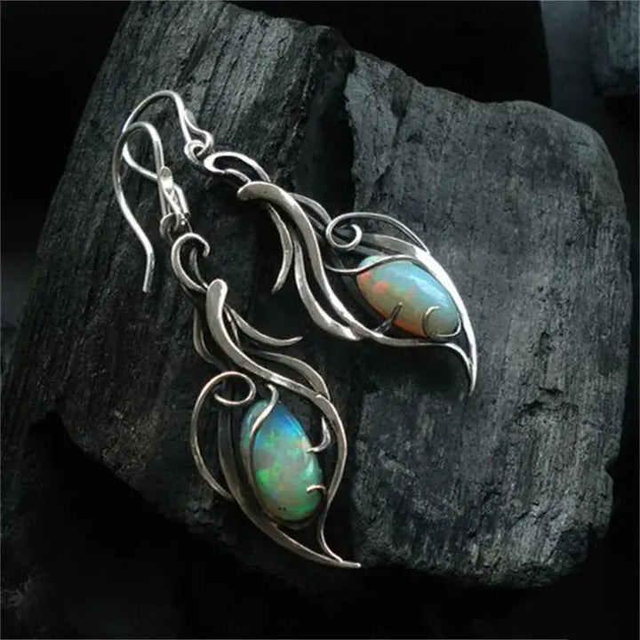 Boucles d'oreilles rétro avec opale bleue | Or blanc