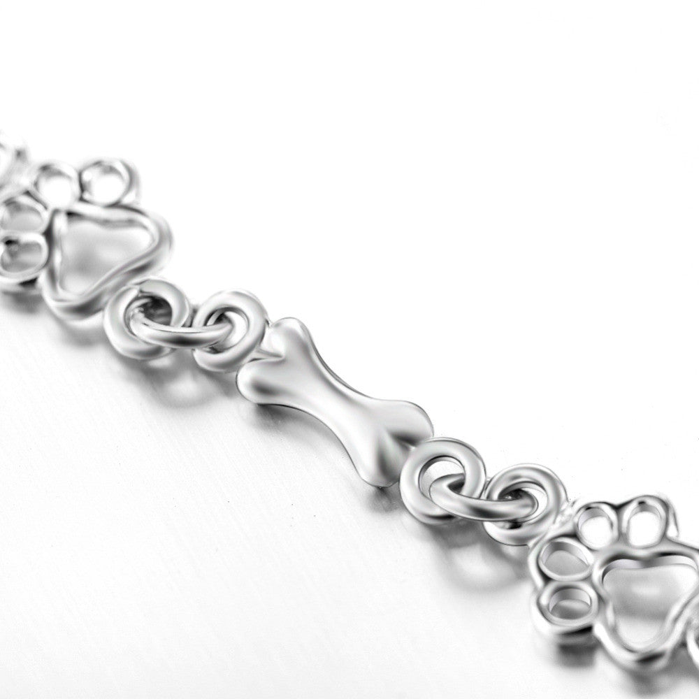Bracelet avec pattes de chien et os, édition limitée | Or blanc