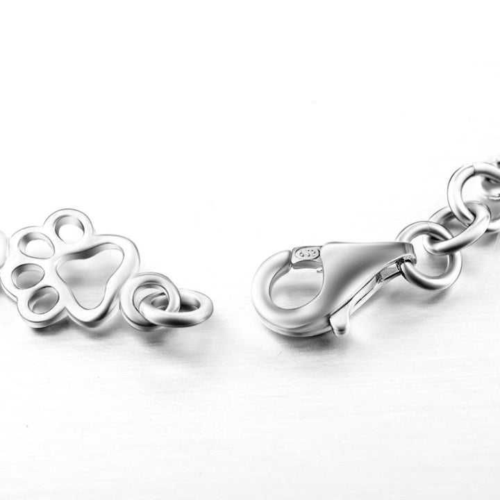 Bracelet avec pattes de chien et os, édition limitée | Or blanc