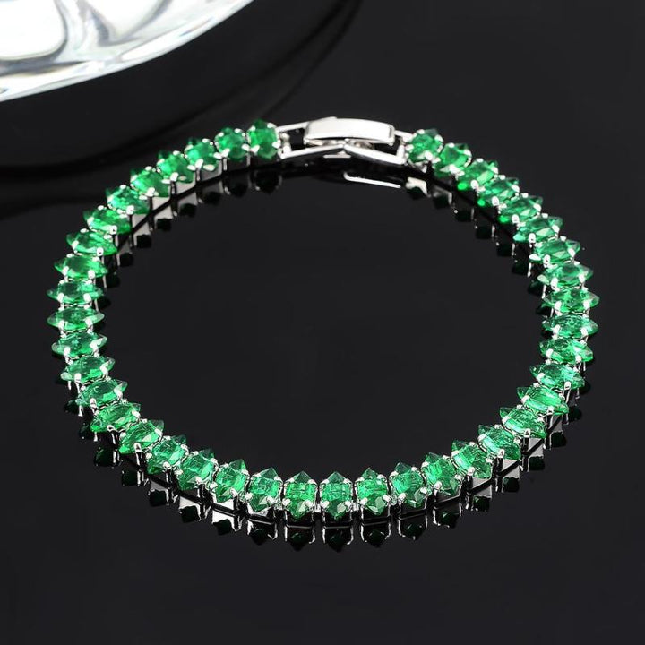 Bracelet avec des pierres d'émeraude | Or