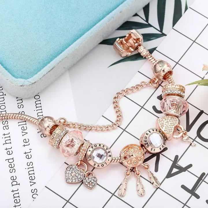 Bracelet capteur de rêves rose avec pendentifs | Or blanc
