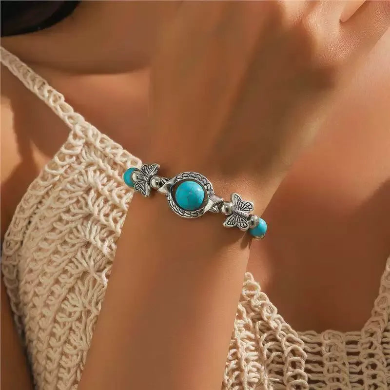 Bracelet avec des papillons | Or blanc