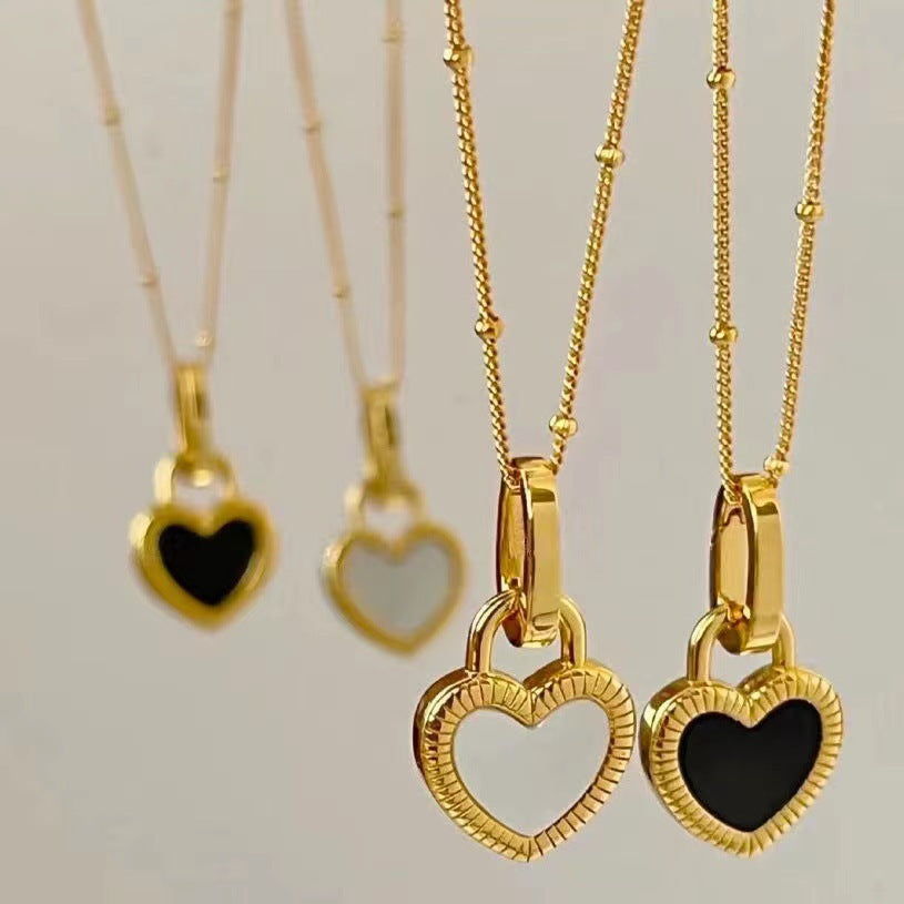 Collier avec pendentif en noir et blanc cœur | Or