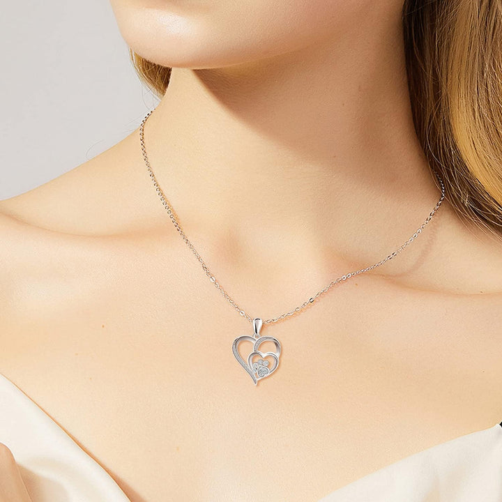 Collier avec patte et cœur à brillants | Or blanc