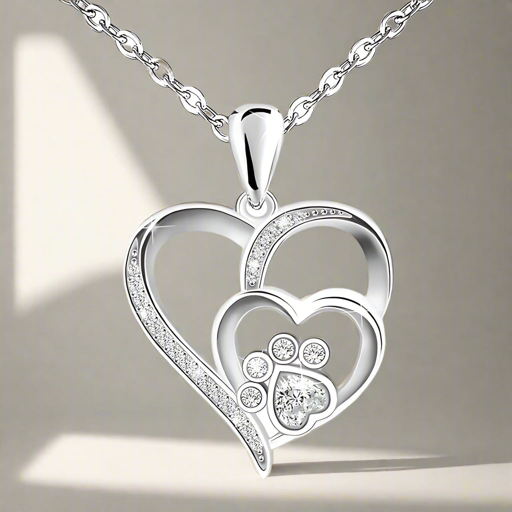 Collier avec patte et cœur à brillants | Or blanc