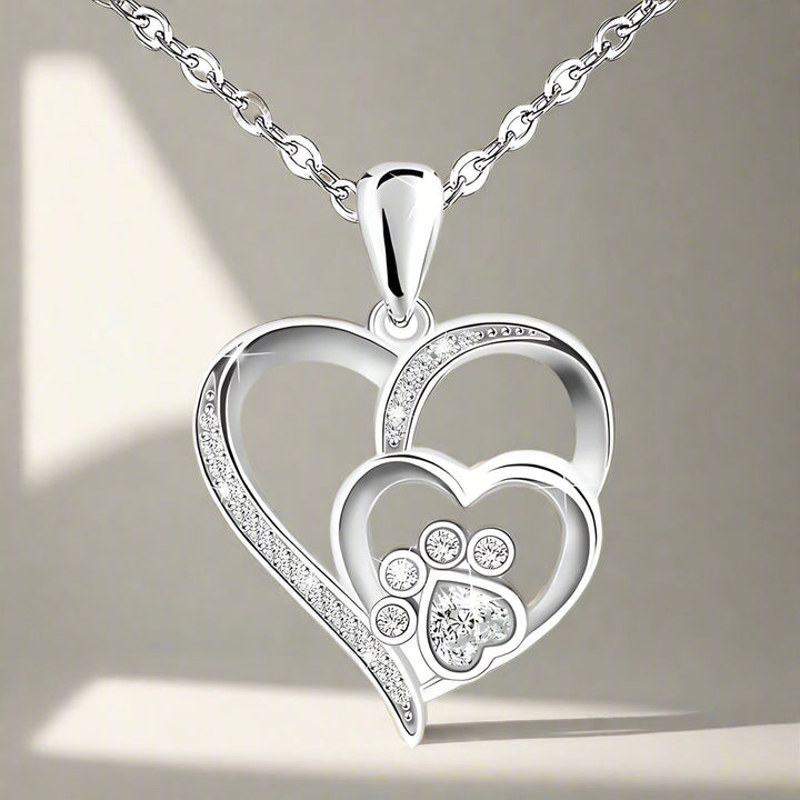 Collier avec patte et cœur à brillants | Or blanc