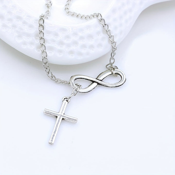 Pendentif croix éternelle | Or blanc