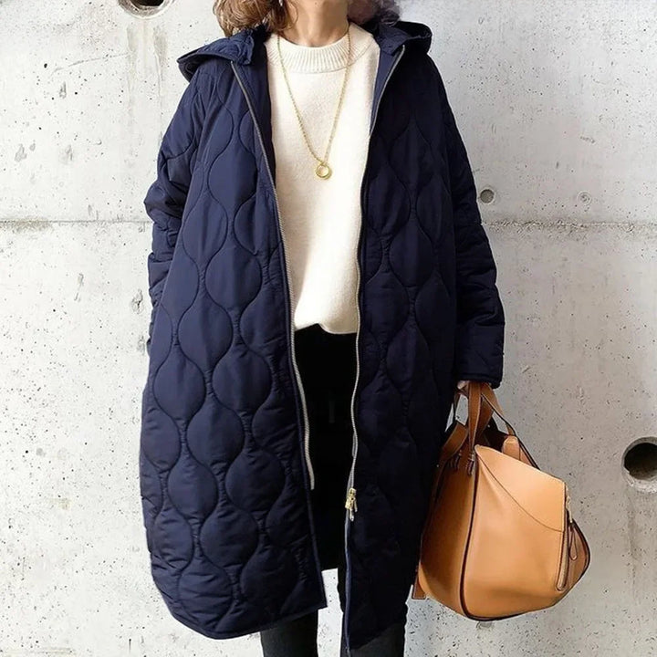 Veste matelassée femme Longline | Capuche & Design thermique