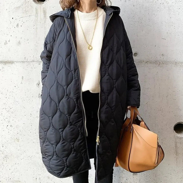 Veste matelassée femme Longline | Capuche & Design thermique